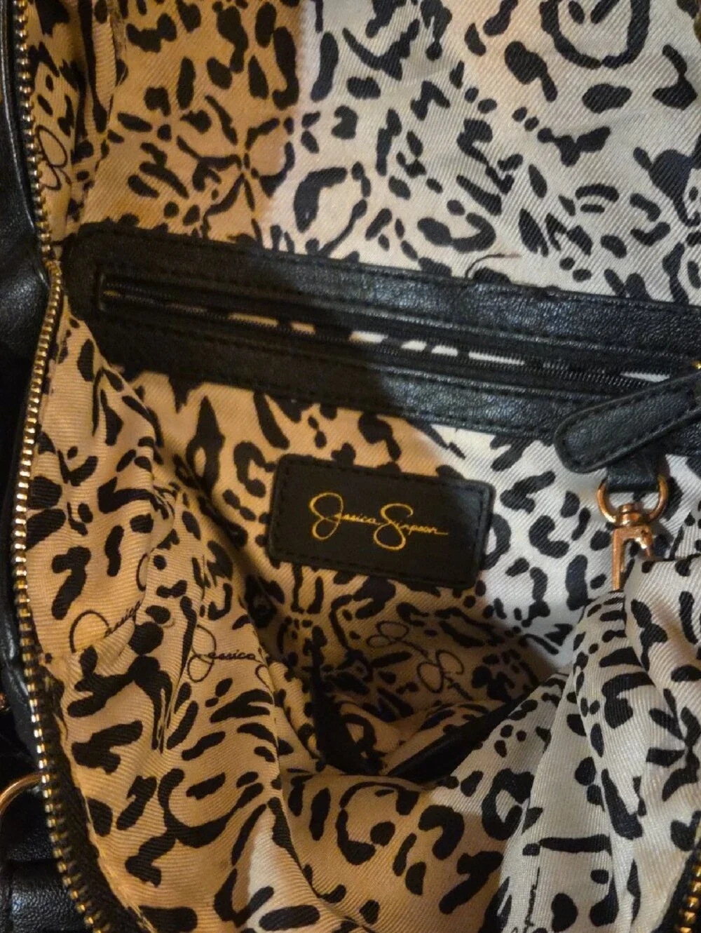 Jessica Simpson Black Studded Backpack with Gold Feather Charm